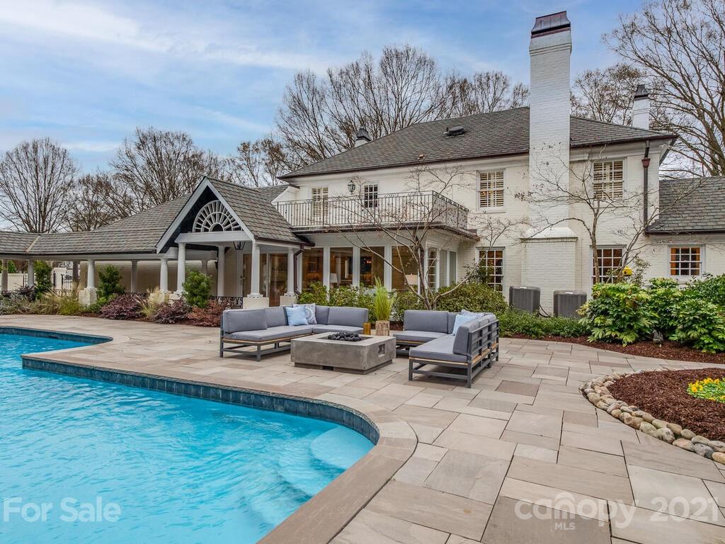 3422 Sharon Road Charlotte, NC 28211 - Photo 40 of 48 a front view of a house with garden