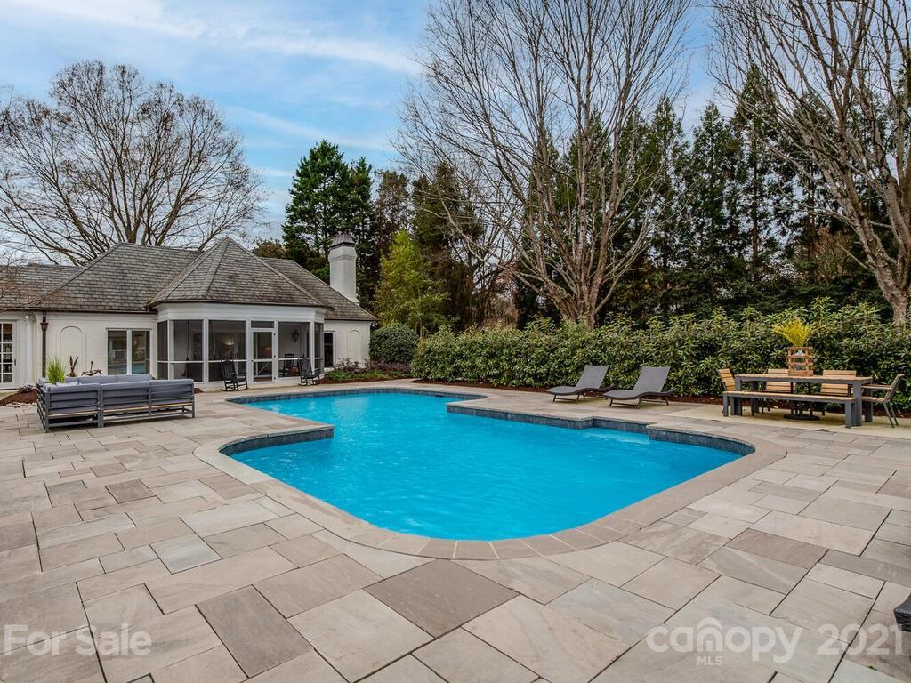 3422 Sharon Road Charlotte, NC 28211 - Photo 41 of 48 a view of swimming pool and lounge chair