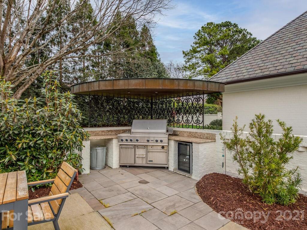 3422 Sharon Road Charlotte, NC 28211 - Photo 42 of 48 a view of a chairs and table in the patio