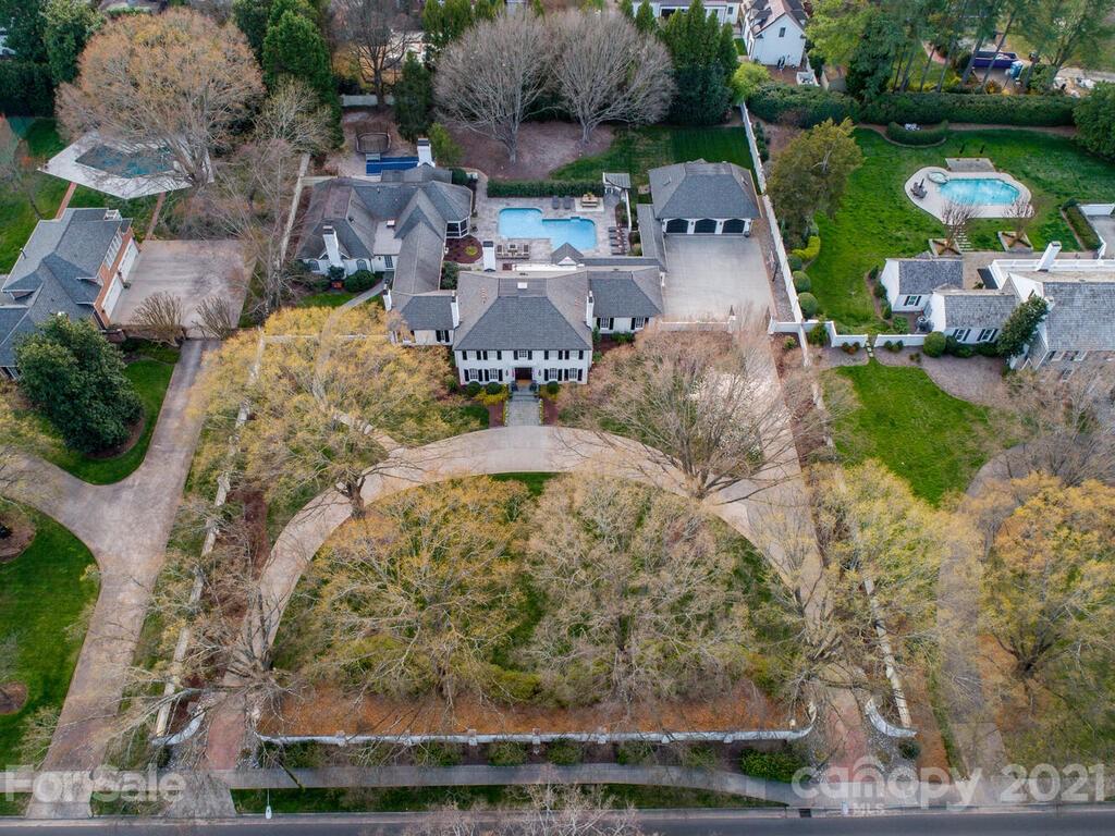 3422 Sharon Road Charlotte, NC 28211 - Photo 45 of 48 an aerial view of a house with a yard and lake