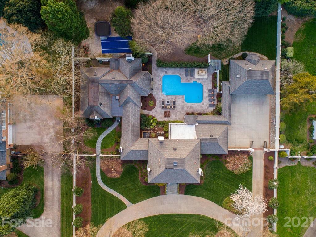 3422 Sharon Road Charlotte, NC 28211 - Photo 46 of 48 an aerial view of multiple houses with outdoor space