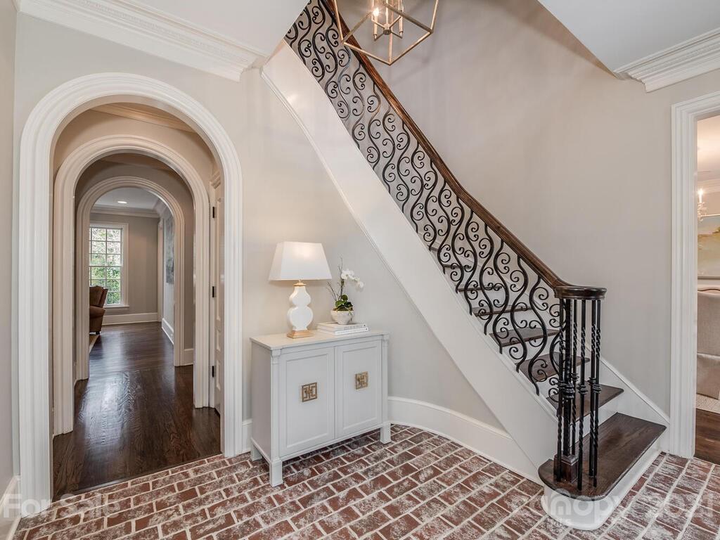 3422 Sharon Road Charlotte, NC 28211 - Photo 6 of 48 a view of entryway and hall with wooden floor