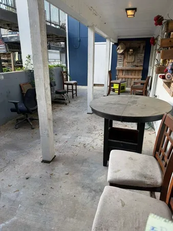 a room with table and chairs
