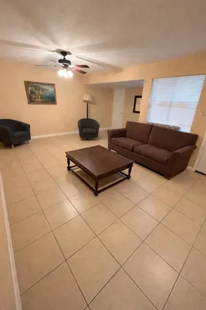 a room with a table and a window
