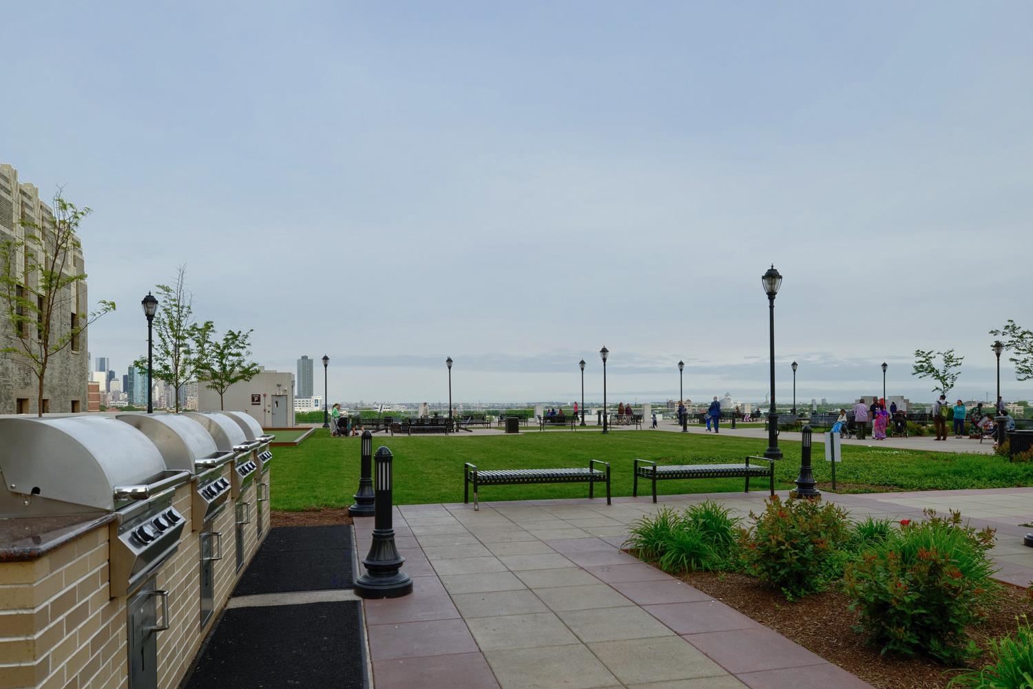4 Beacon Way, Unit 211 Jersey City, NJ 07304 - Photo 11 of 22 a view of a garden with sitting area