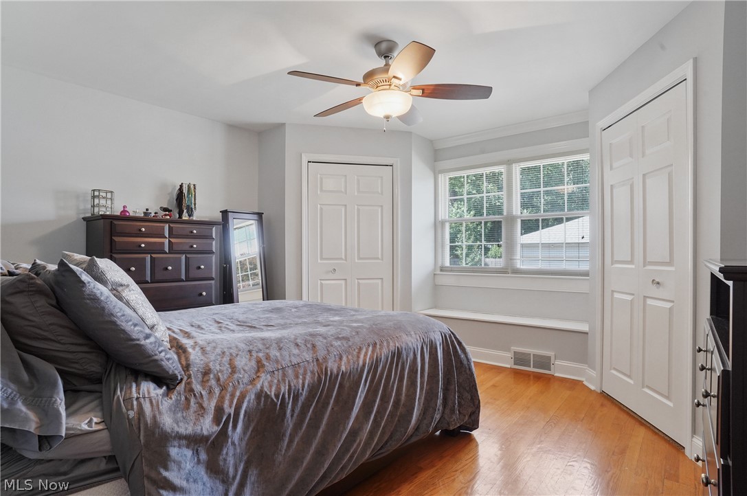 1150 Garman Road Akron, OH 44313 - Photo 19 of 38 Bedroom featuring light hardwood / wood-style flooring and ceiling fan