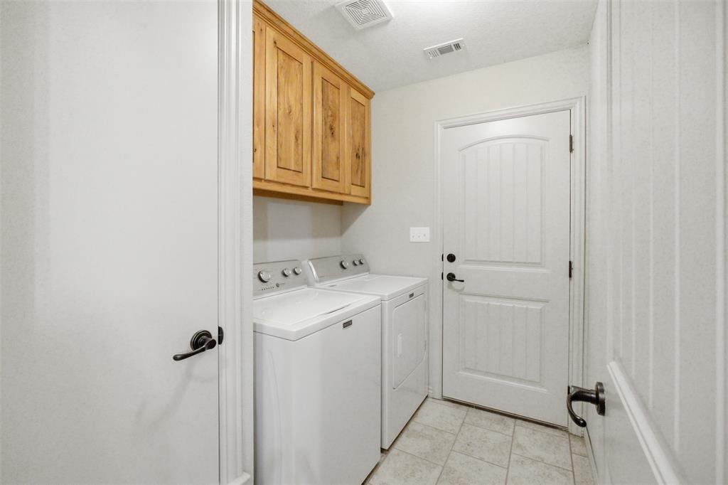 505 East 5th Street Springtown, TX 76082 - Photo 26 of 39 a view of a storage and utility room with a sink