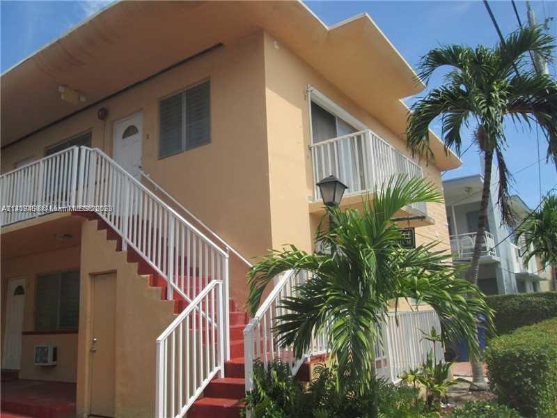 7720 Harding Avenue, Unit 11 Miami Beach, FL 33141 - Photo 1 of 7 a view of balcony and small yard