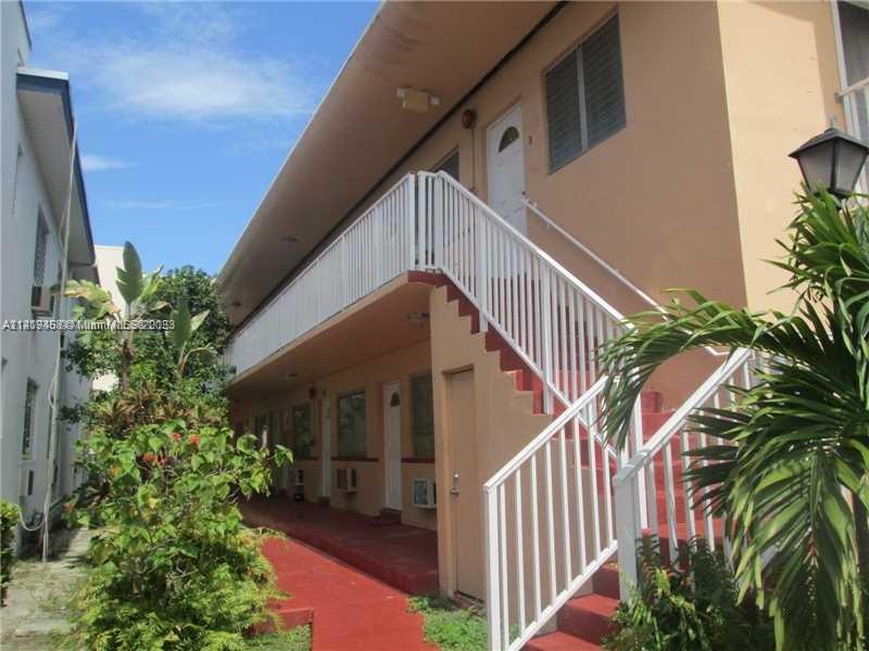 7720 Harding Avenue, Unit 11 Miami Beach, FL 33141 - Photo 2 of 7 a view of entryway with flower plants