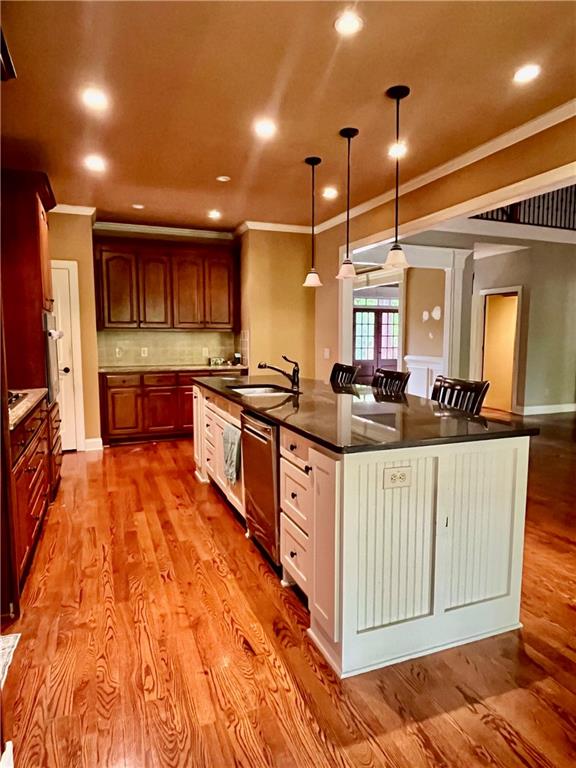 348 Hidden Trail Pendergrass, GA 30567 - Photo 16 of 40 a large kitchen with stainless steel appliances a large counter top a stove a sink and a refrigerator