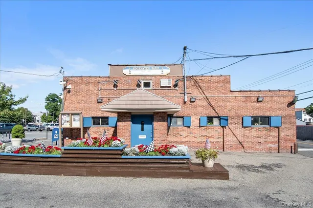 a view of a living room with a large tree
