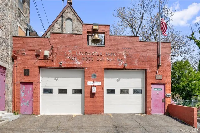 a view of a park with large trees