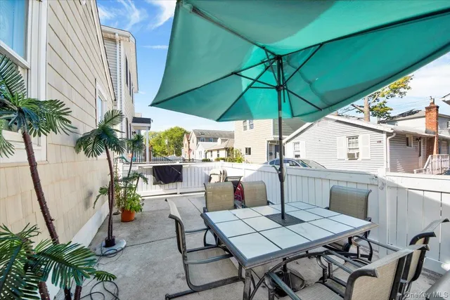 a view of outdoor kitchen and patio