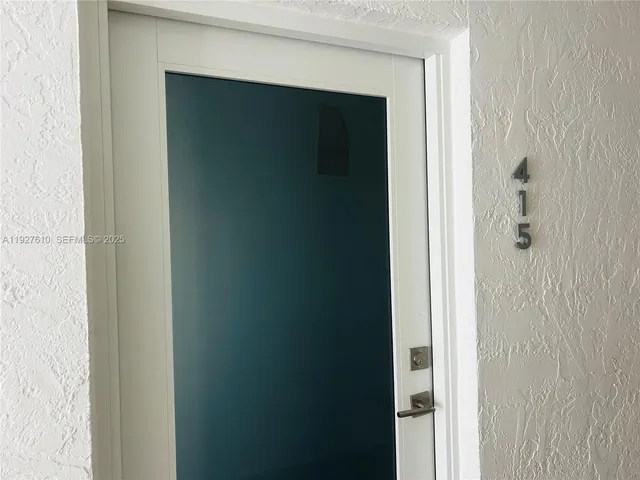 a close view of a bathroom with a shower