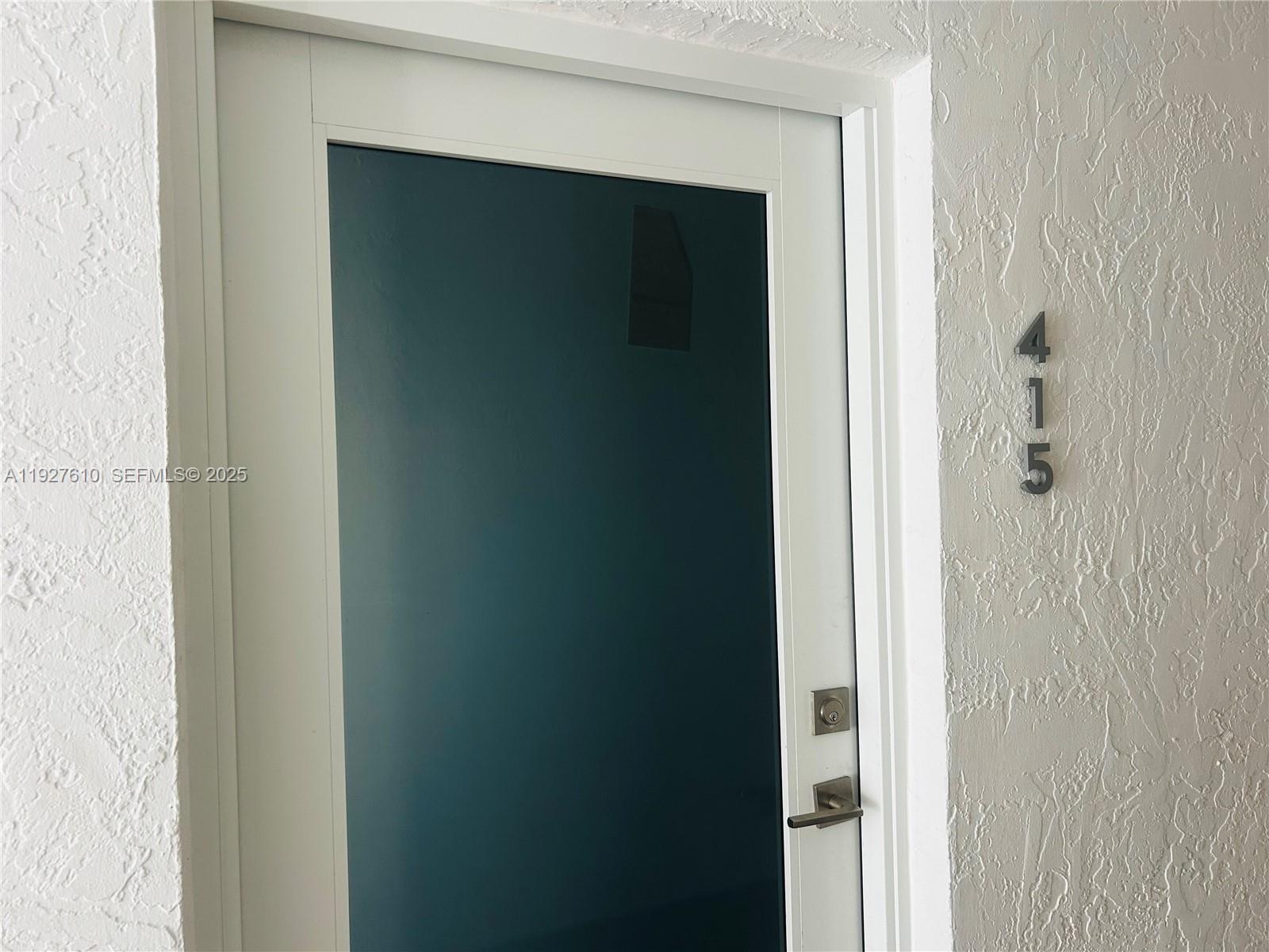 1665 Bay Road, Unit 415 Miami Beach, FL 33139 - Photo 2 of 7 a close view of a bathroom with a shower