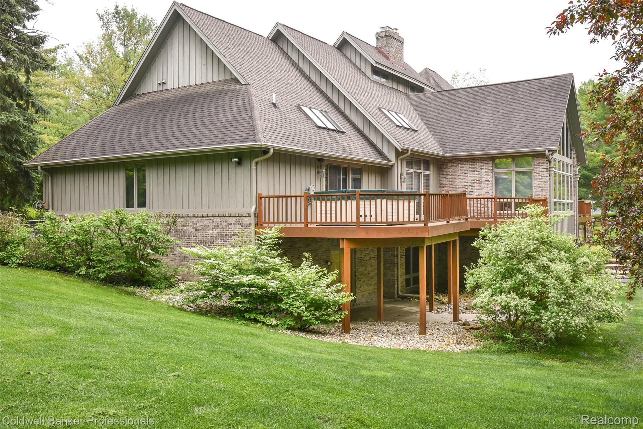 9275 Fox Hollow Road Clarkston, MI 48348 - Photo 5 of 68 9275 Fox Hollow Rear View of Deck and Hot Tub.jpg