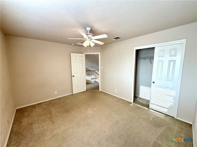 an empty room with a bathroom