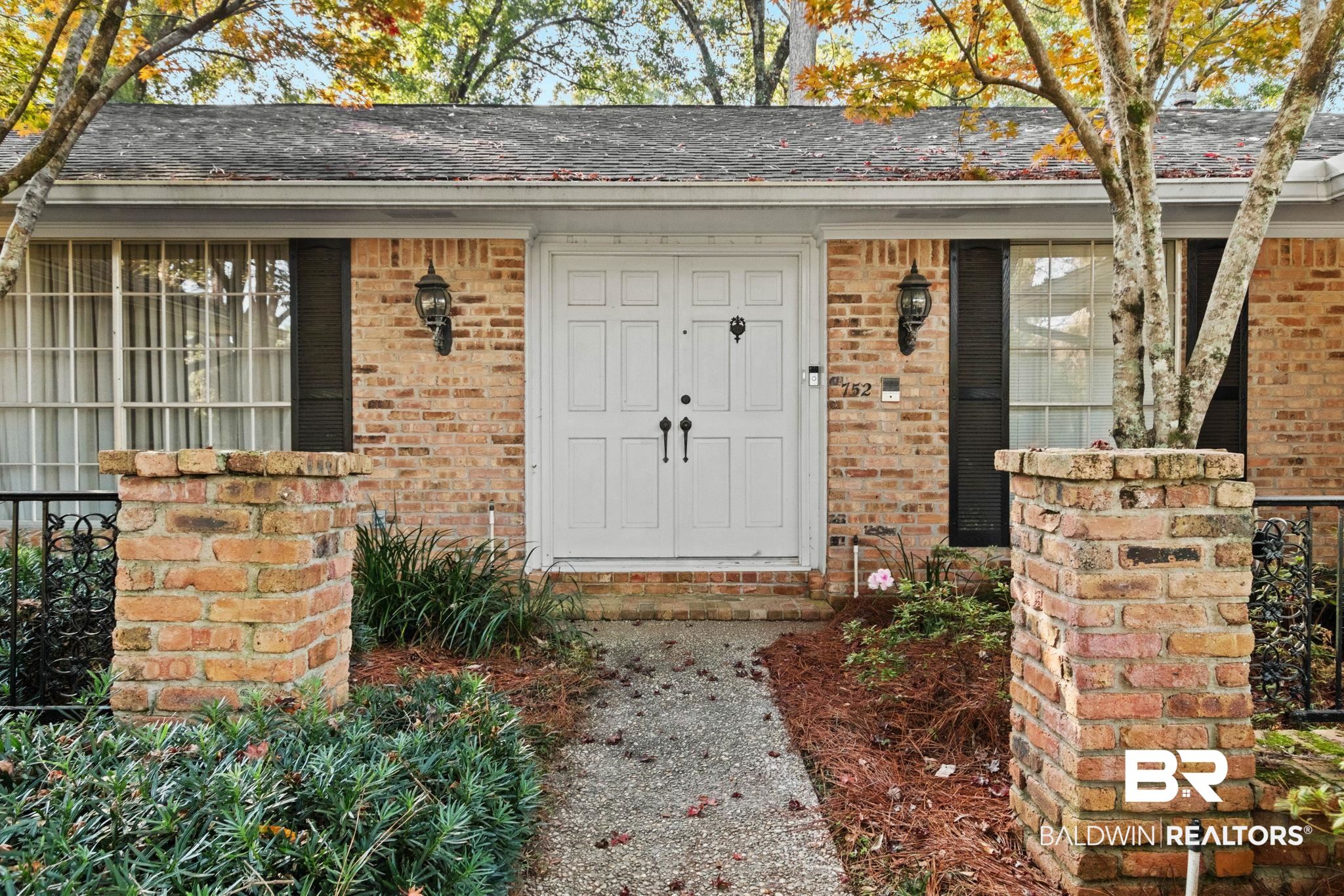 752 Evergreen Street Fairhope, AL 36532 - Photo 84 of 100 Property entrance with a shingled roof and brick siding