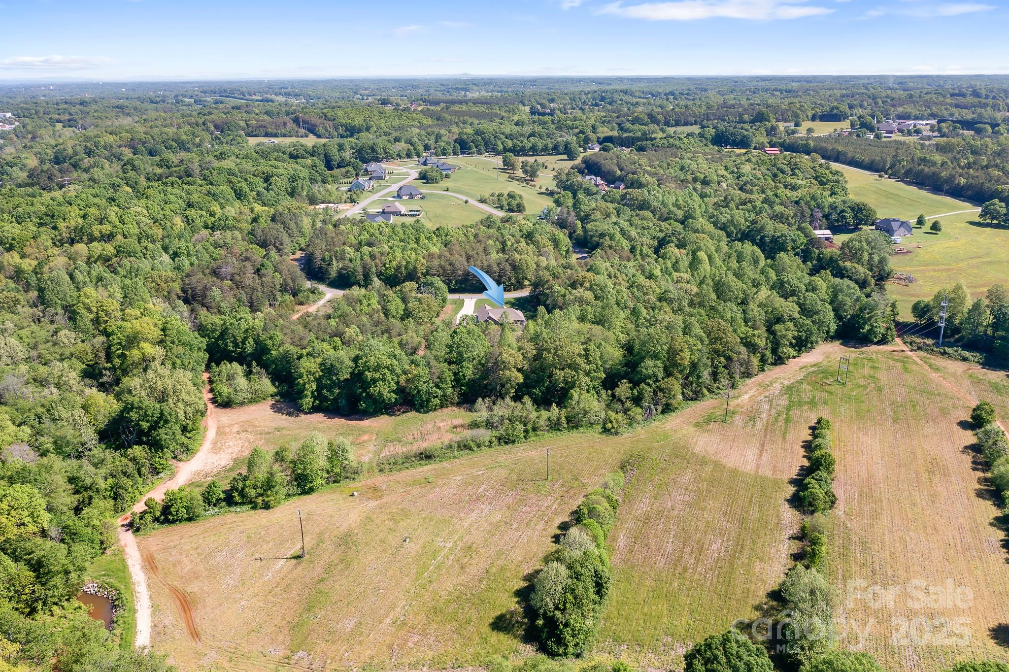 730 Oak Ridge Farms Circle, Unit 14 Newton, NC 28658 - Photo 15 of 42 an aerial view of a house