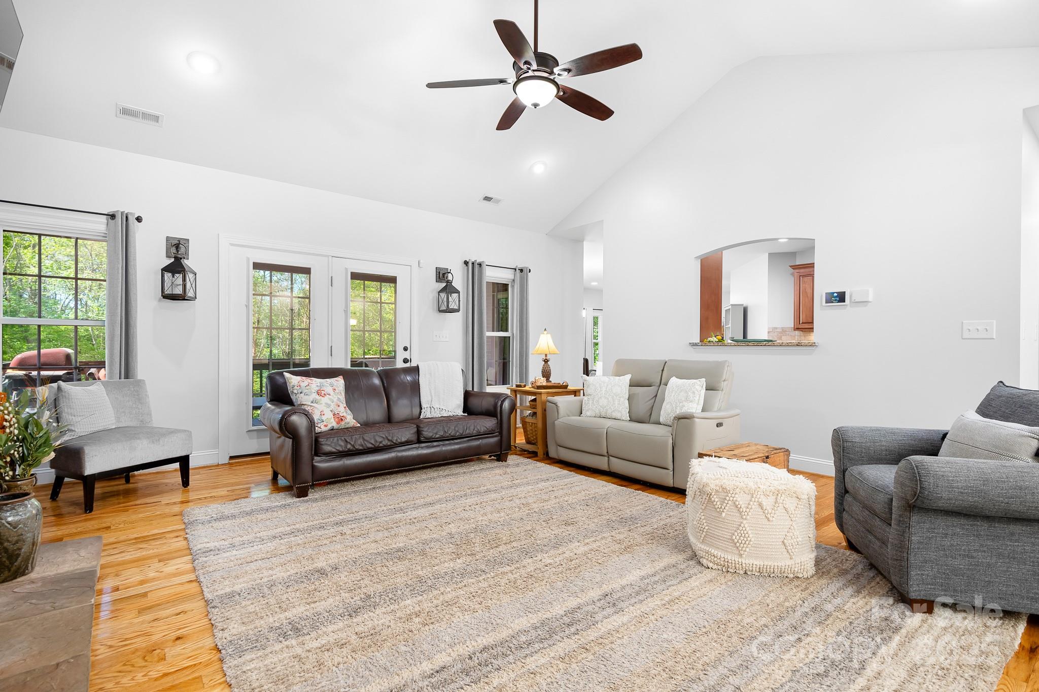 730 Oak Ridge Farms Circle, Unit 14 Newton, NC 28658 - Photo 19 of 42 a living room with furniture and a view of bedroom