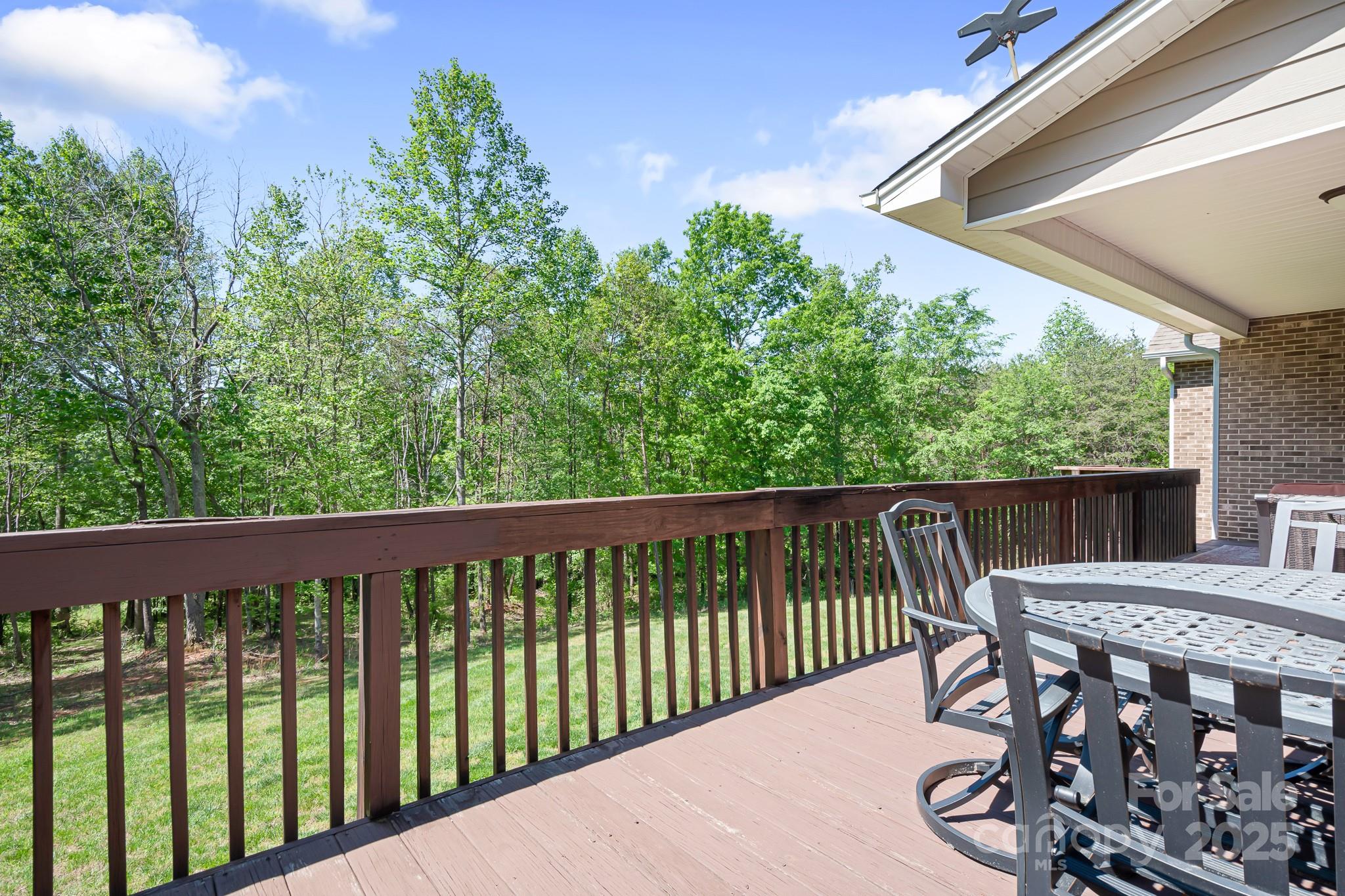 730 Oak Ridge Farms Circle, Unit 14 Newton, NC 28658 - Photo 21 of 42 a view of a balcony with wooden floor