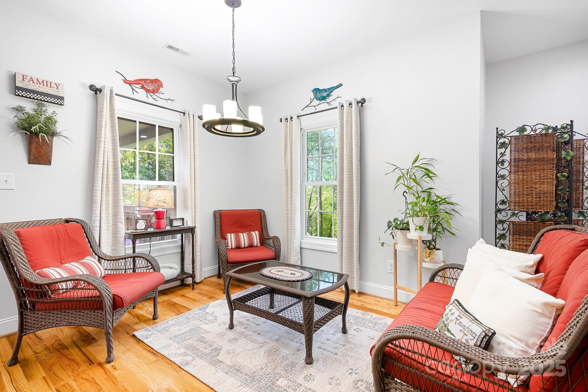 730 Oak Ridge Farms Circle, Unit 14 Newton, NC 28658 - Photo 23 of 42 a living room with furniture a rug and a window