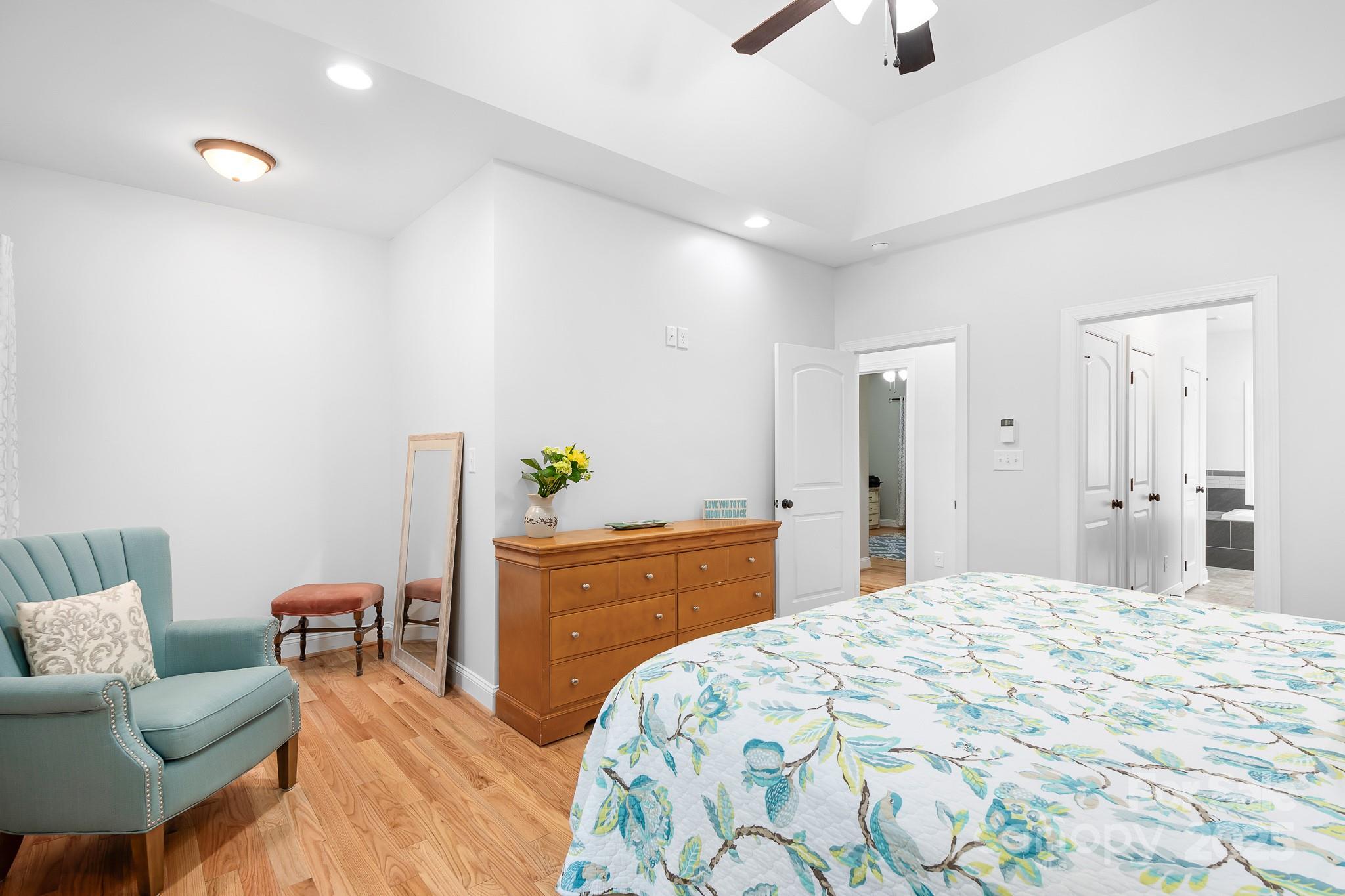 730 Oak Ridge Farms Circle, Unit 14 Newton, NC 28658 - Photo 29 of 42 a bedroom with a bed and a couch