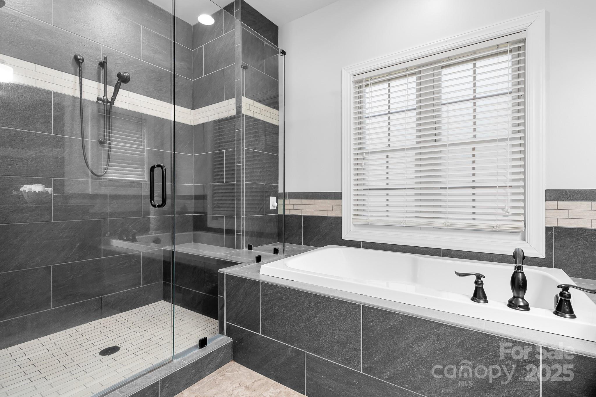 730 Oak Ridge Farms Circle, Unit 14 Newton, NC 28658 - Photo 31 of 42 a bathroom with a shower and a sink