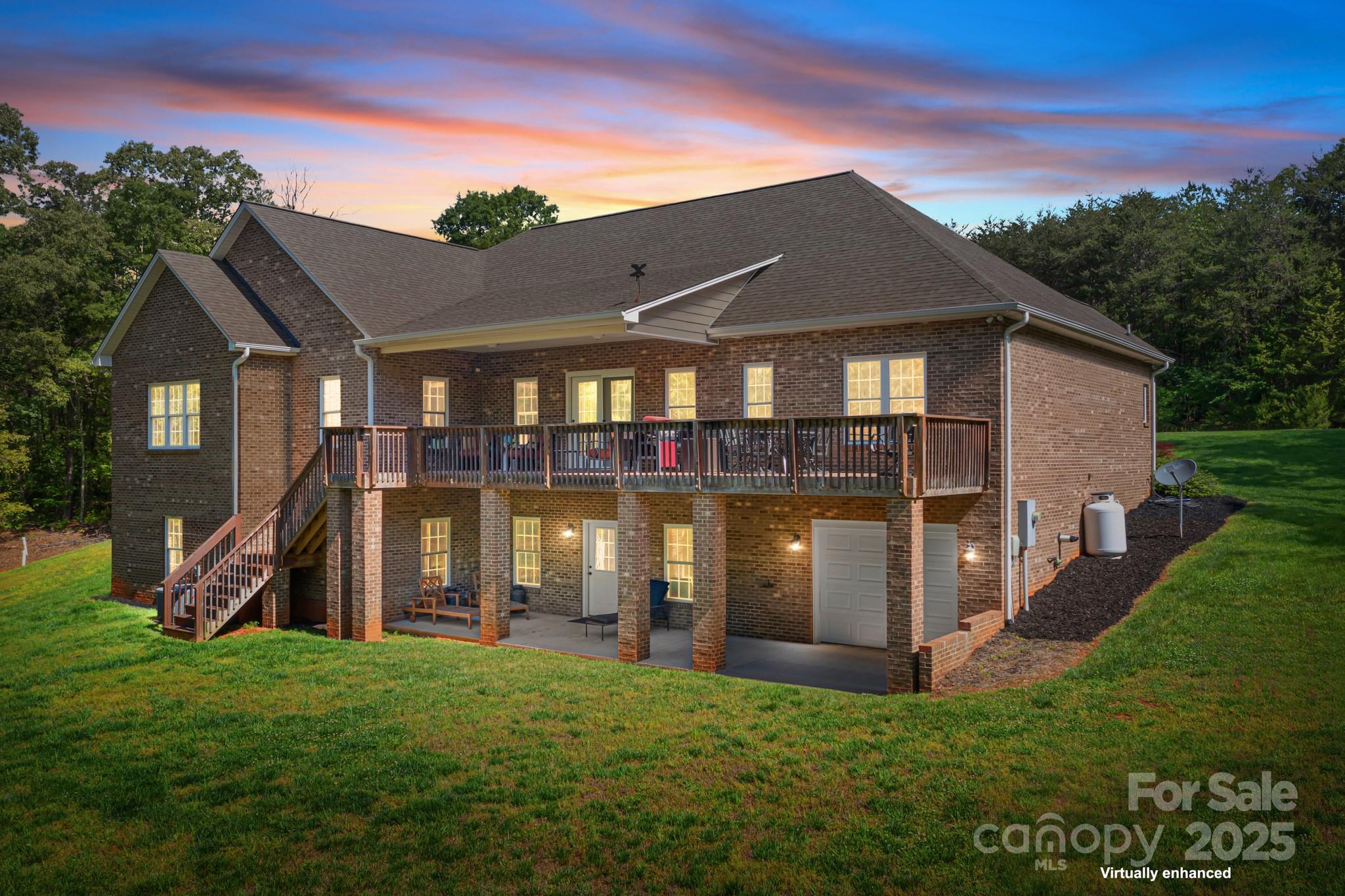 730 Oak Ridge Farms Circle, Unit 14 Newton, NC 28658 - Photo 8 of 42 a house view with a garden space
