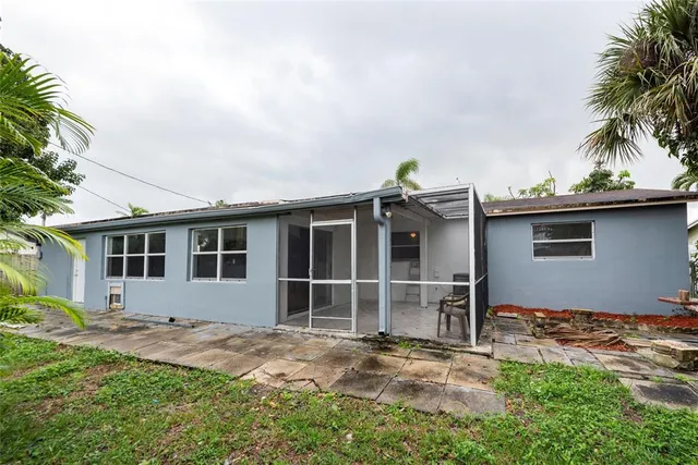 a house view with a backyard space