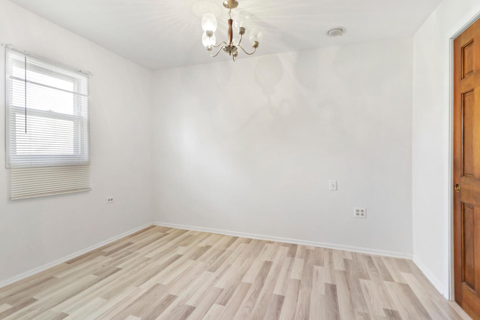 149 West Schick Road Bloomingdale, IL 60108 - Photo 12 of 35 an empty room with a window