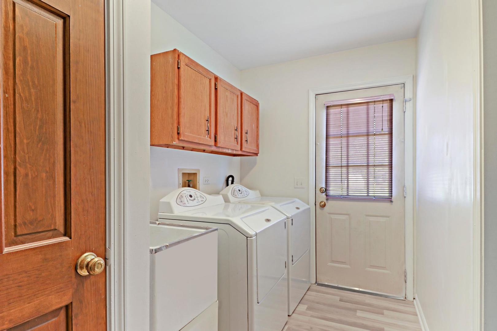 149 West Schick Road Bloomingdale, IL 60108 - Photo 13 of 35 a utility room with dryer and washer