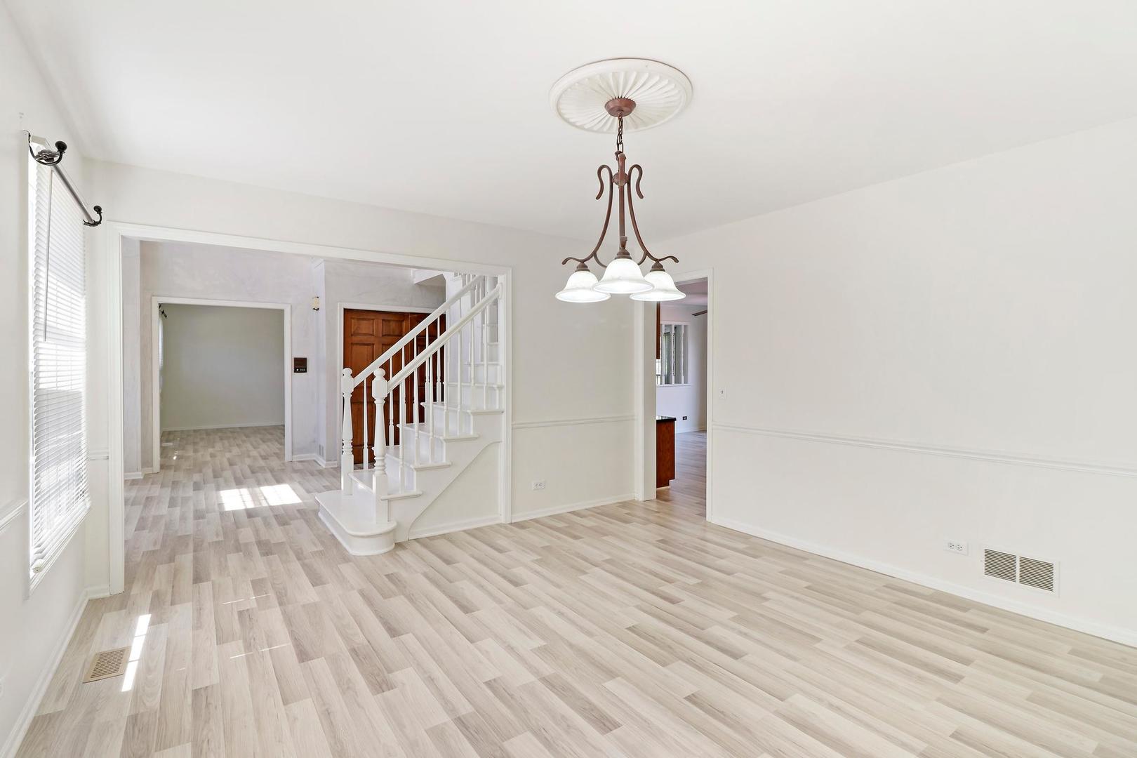 149 West Schick Road Bloomingdale, IL 60108 - Photo 14 of 35 a view of a livingroom with wooden floor