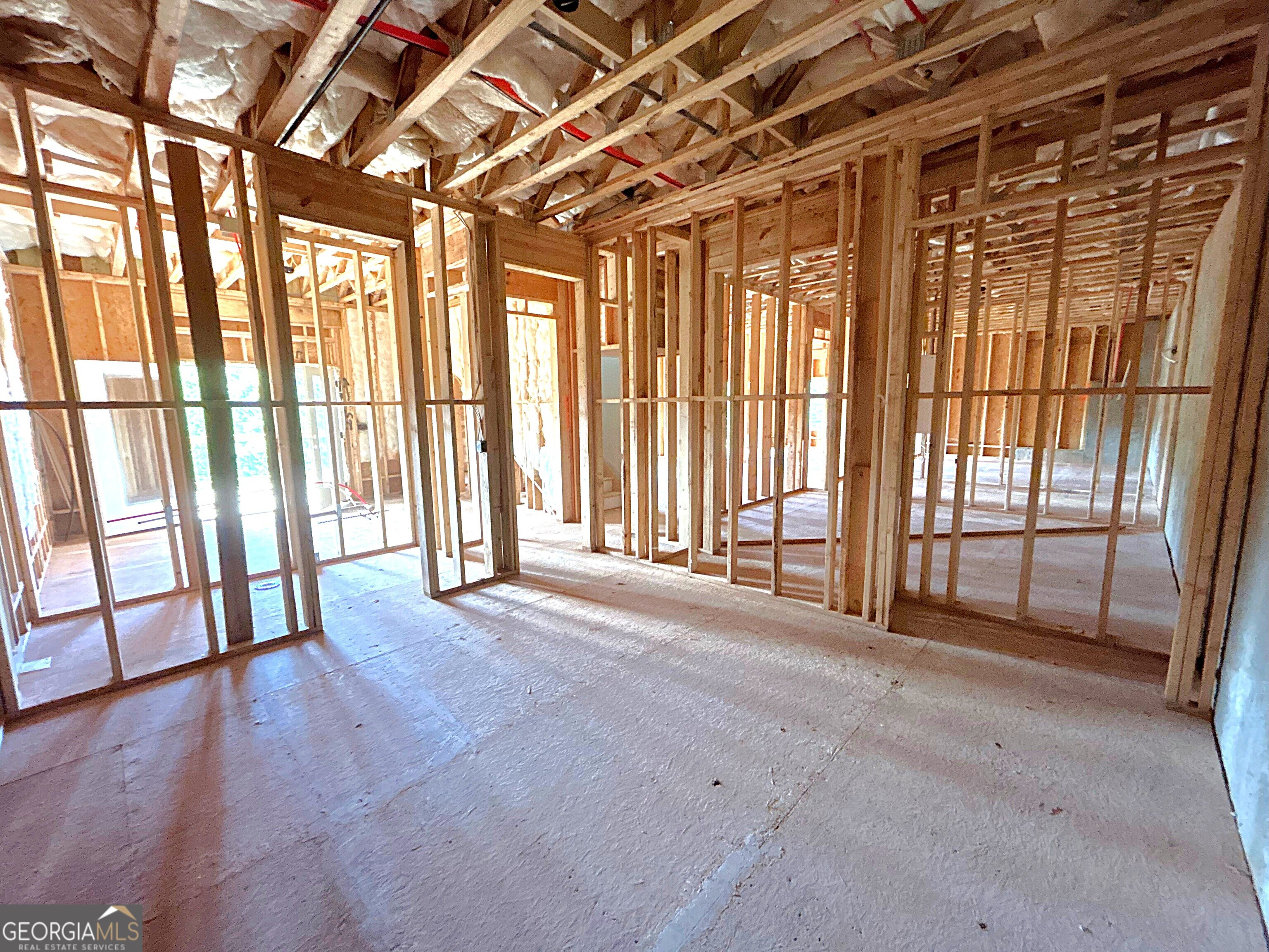 438 Mill Ridge Road Hiawassee, GA 30546 - Photo 25 of 75 a view of an empty room with a sliding door