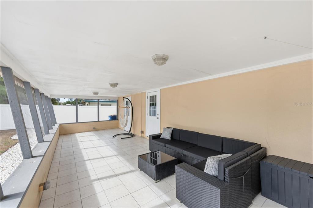 1439 Wilson Road Clearwater, FL 33755 - Photo 22 of 26 a view of outdoor space with seating area