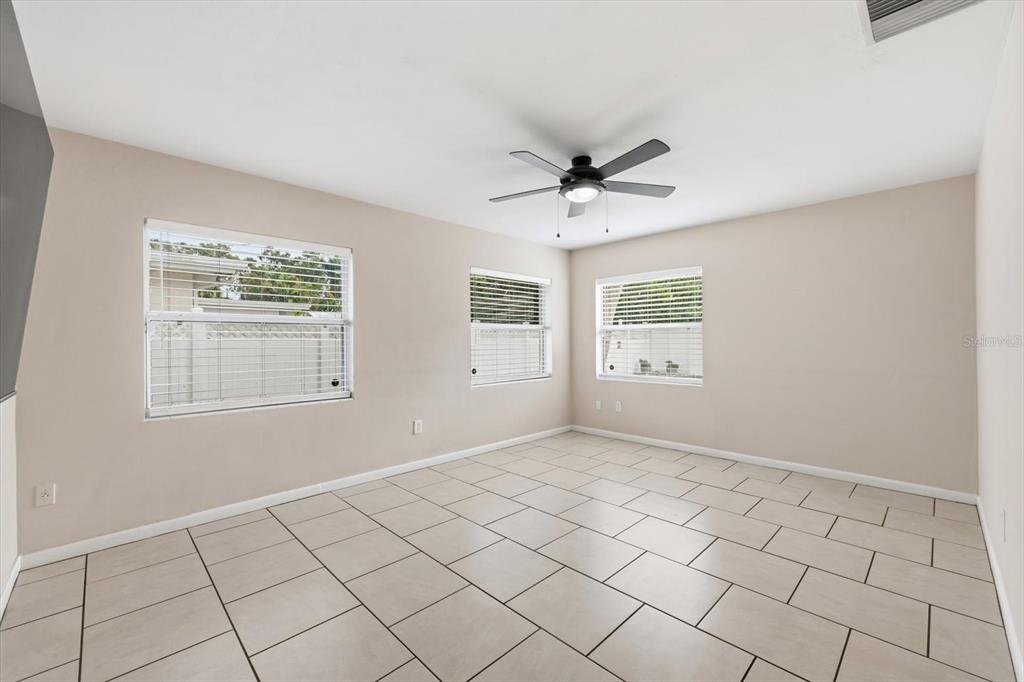1439 Wilson Road Clearwater, FL 33755 - Photo 10 of 26 a view of an empty room with a window
