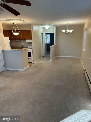 a view of a kitchen with a sink
