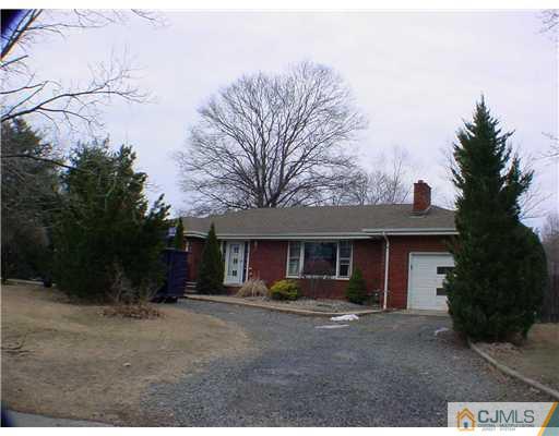32 Middlesex Road Old Bridge, NJ 07747 - Photo 1 of 8 a view of a house with a yard and tree s