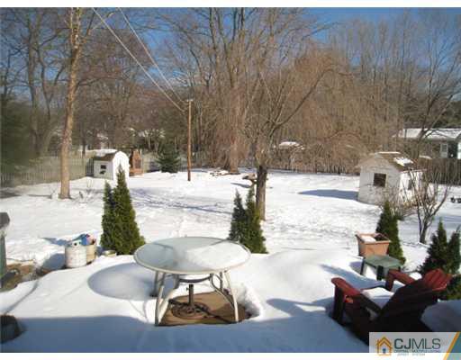 32 Middlesex Road Old Bridge, NJ 07747 - Photo 4 of 8 a view of a yard of the house