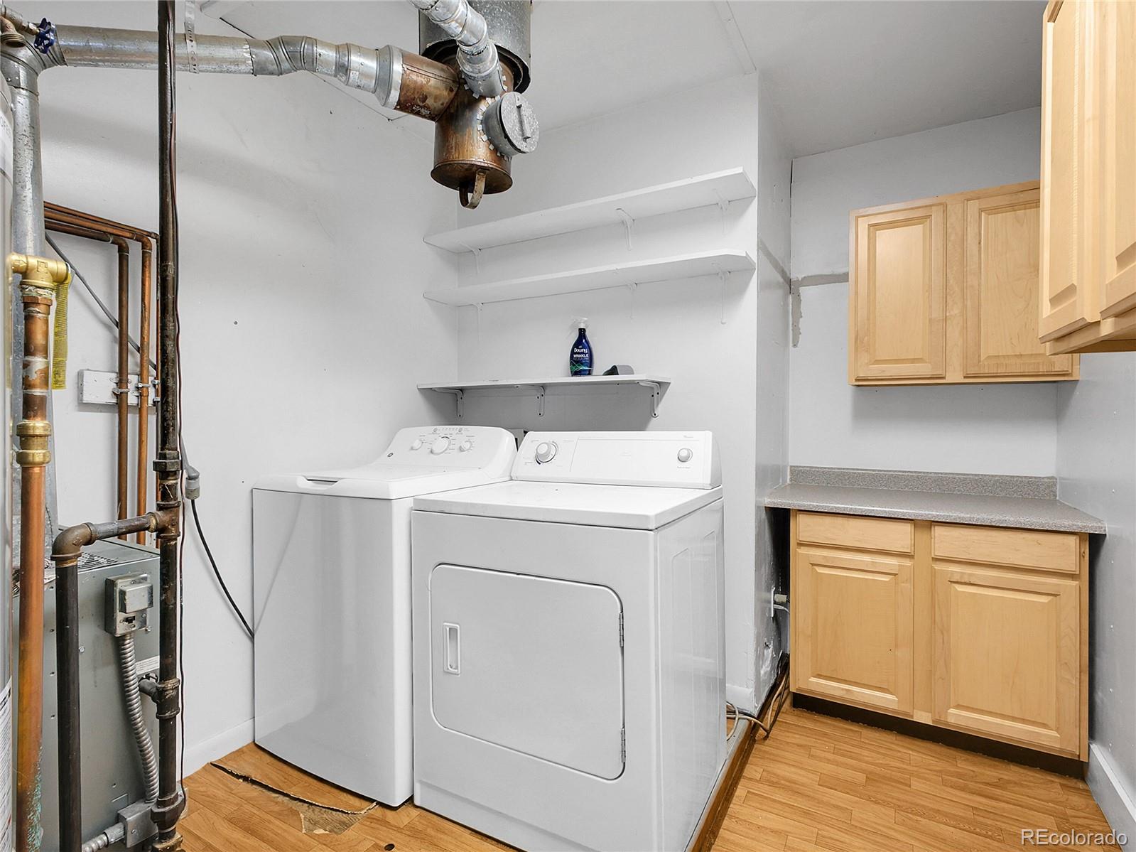 28449 Douglas Park Road Evergreen, CO 80439 - Photo 15 of 25 a utility room with dryer and washer