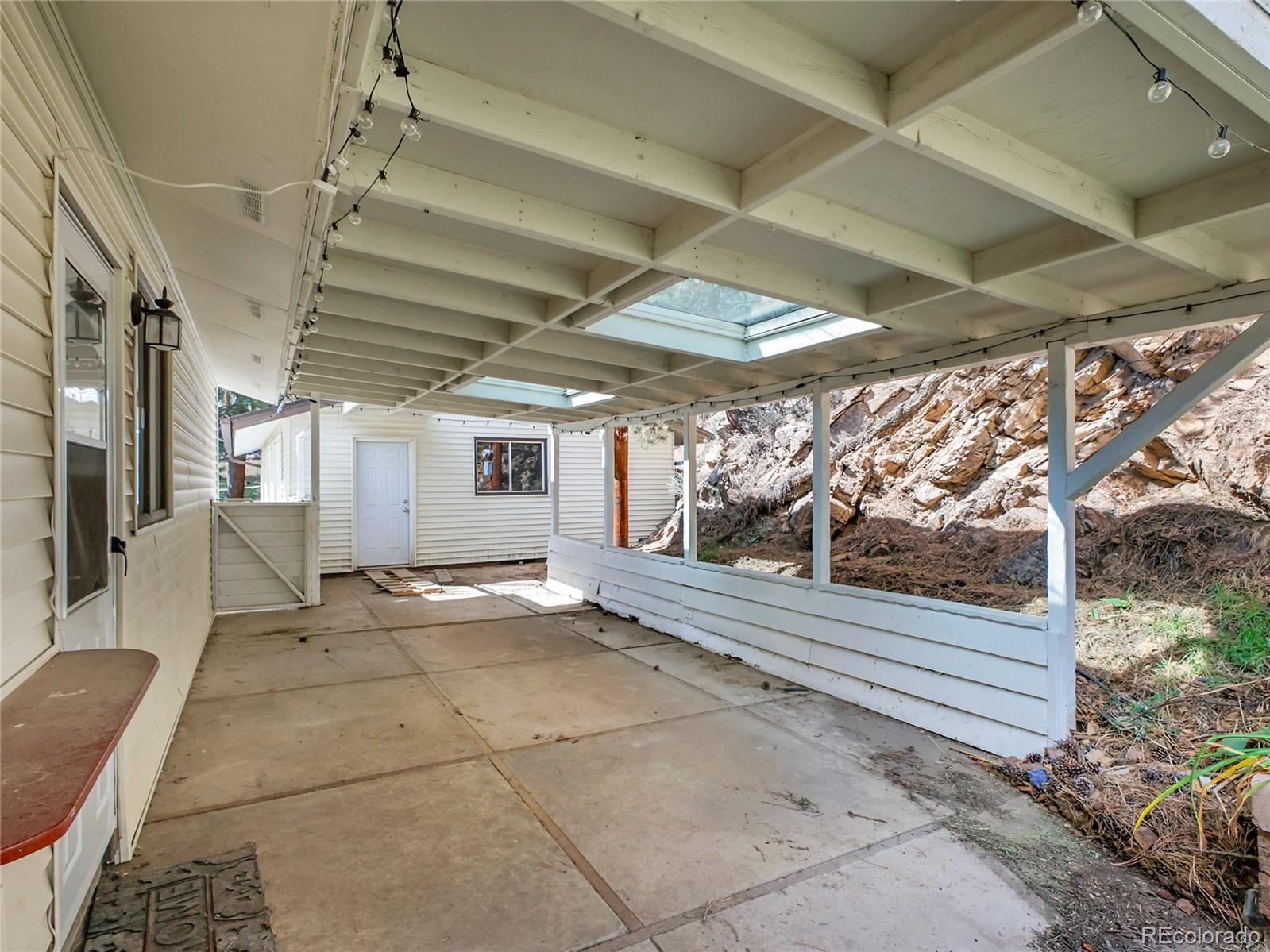 28449 Douglas Park Road Evergreen, CO 80439 - Photo 25 of 25 a view of a porch