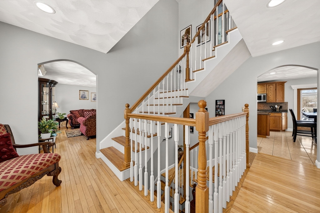 155 Sagamore Road Seekonk, MA 02771 - Photo 18 of 41 a view of entryway livingroom and hall with wooden floor