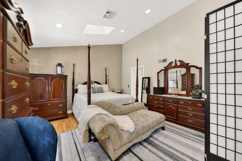 155 Sagamore Road Seekonk, MA 02771 - Photo 21 of 41 a bedroom with furniture and wooden floor