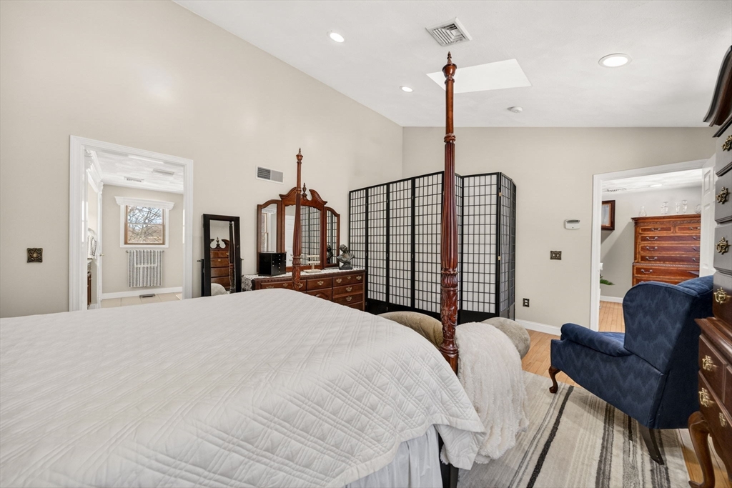 155 Sagamore Road Seekonk, MA 02771 - Photo 22 of 41 a bedroom with a bed a couch and dresser