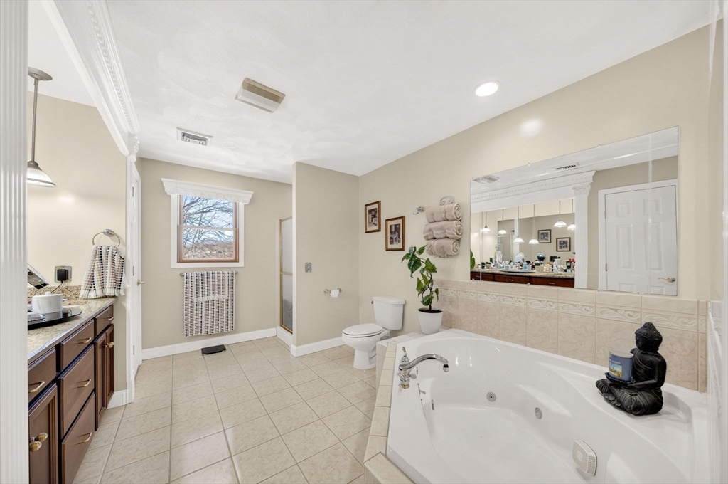 155 Sagamore Road Seekonk, MA 02771 - Photo 23 of 41 a bathroom with a tub sink and mirror