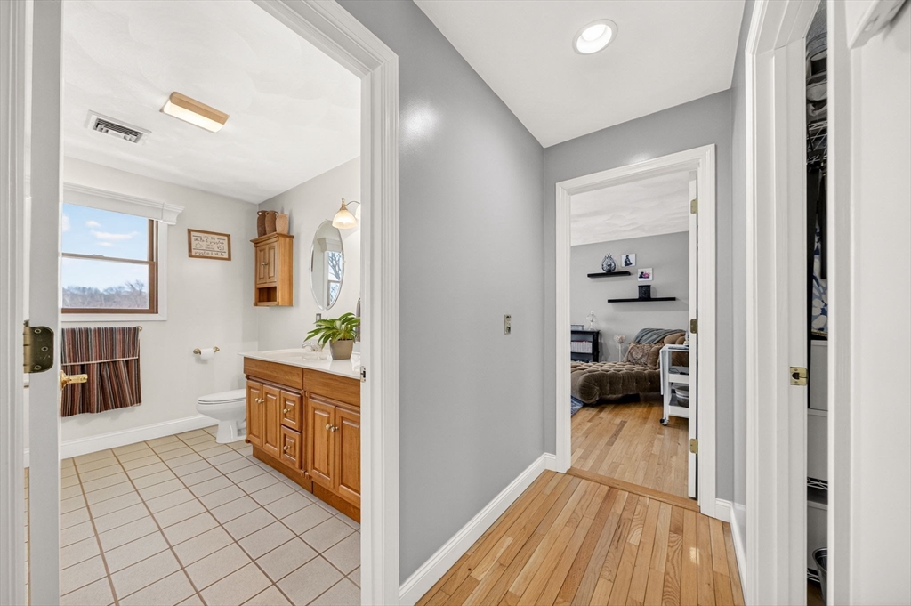 155 Sagamore Road Seekonk, MA 02771 - Photo 27 of 41 a view of a hallway and a livingroom with a furniture