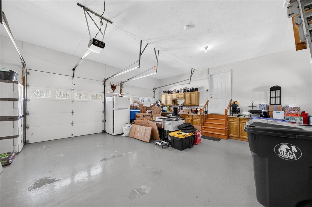 155 Sagamore Road Seekonk, MA 02771 - Photo 33 of 41 a view of a garage with cars