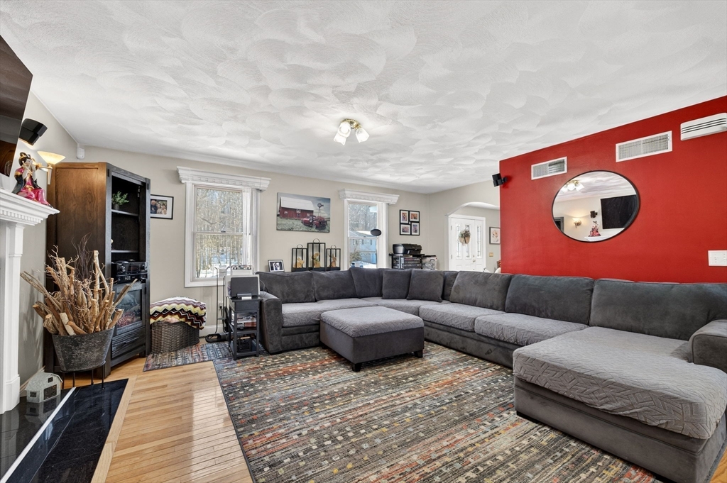 155 Sagamore Road Seekonk, MA 02771 - Photo 7 of 41 a living room with furniture and a rug