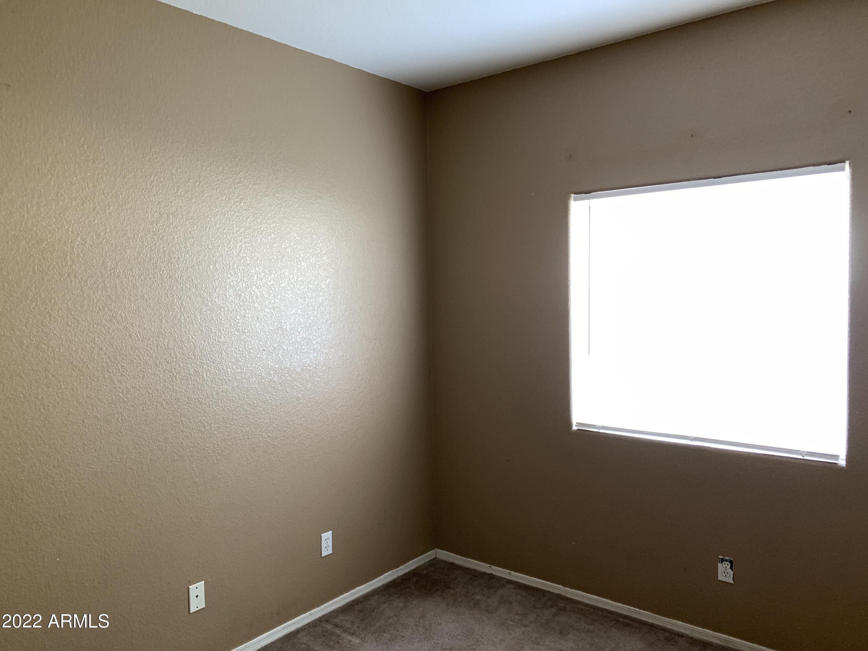 810 South 124th Avenue Avondale, AZ 85323 - Photo 12 of 18 a small space with a window