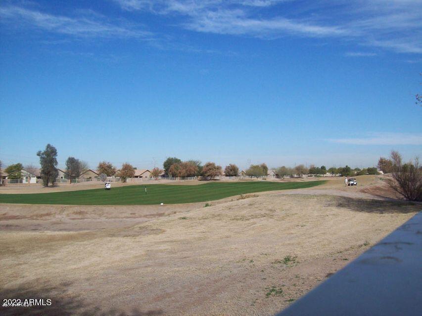 810 South 124th Avenue Avondale, AZ 85323 - Photo 17 of 18 a view of a lake and mountain